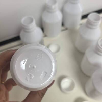 White 125ml PET Plastic Bottle Featuring Printed LOT Number and Glossy Finish Screw Top Cap Ideal for Tus